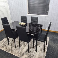 Black dining table set and 6